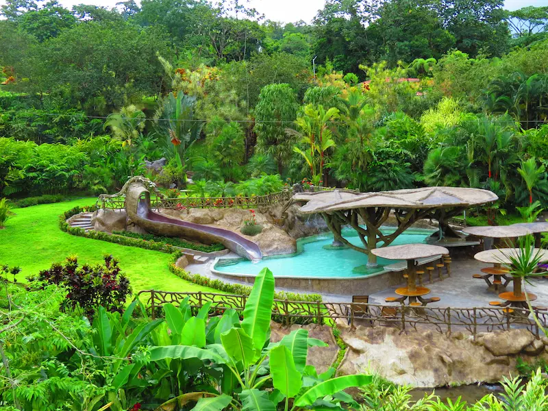 Thermal hot springs surrounded by jungle vegetation, Arenal