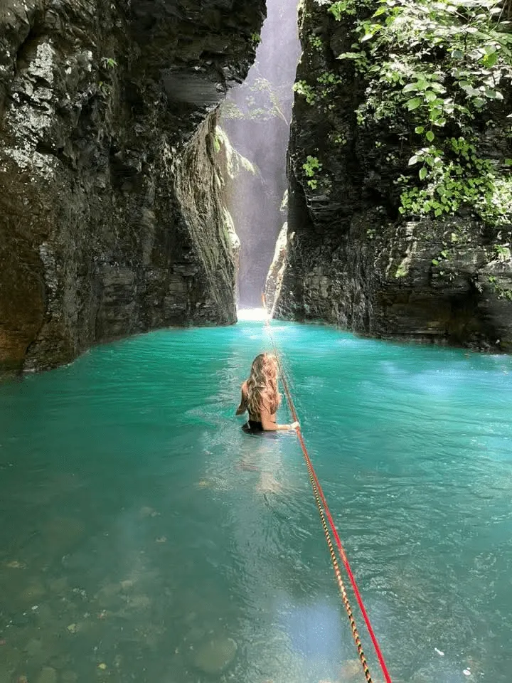 Natural river pools inside stone canyon on La Leona hike