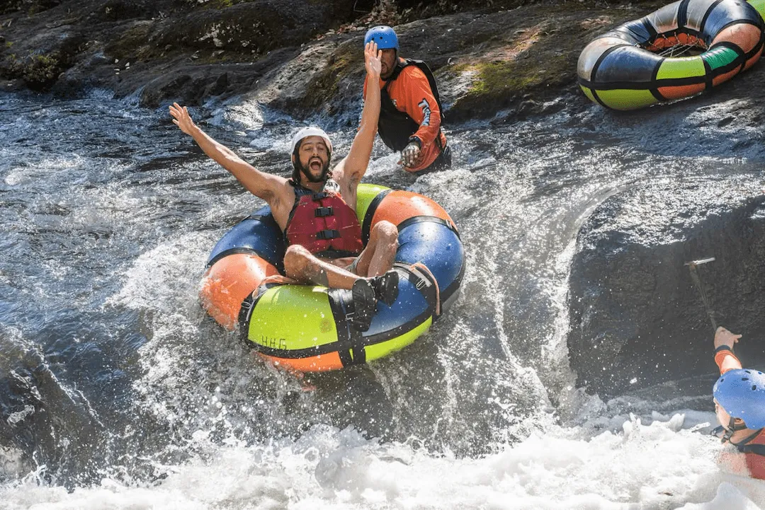 Tubing through rapids below La Leona Waterfall, Costa Rica