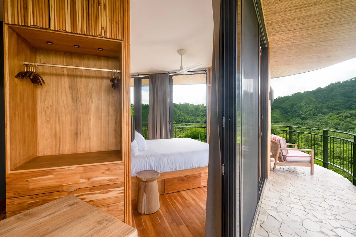 Panoramic mountain view from an elevated treehouse suite at Suitree Experience Hotel, Guanacaste, Costa Rica